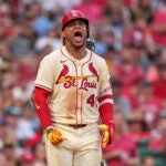 St. Louis Cardinals' Willson Contreras yells after being hit by a pitch during the fourth inning of a baseball game against the San Diego Padres Saturday, July 26, 2025, in St. Louis.