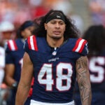 New England Patriots linebacker Jahlani Tavai (48) walks the sideline during an NFL football game against the Tampa Bay Buccaneers, Sunday, Nov. 9, 2025, in Tampa, Fla. Patriots defeated the Buccaneers 28-23.