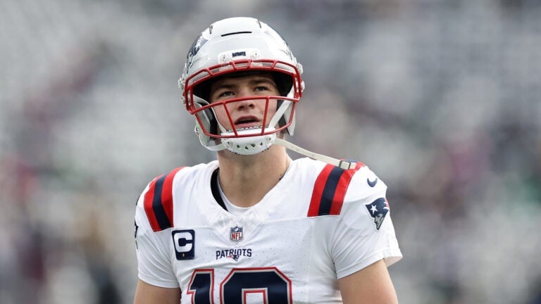 New England Patriots quarterback Drake Maye looks on before an NFL football game against the New York Jets, Sunday, Dec. 28, 2025, in East Rutherford, N.J.