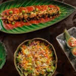 Potato croqueta, wagyu steak carpaccio, Infidel Caesar, and tuna puffs at My Girl.