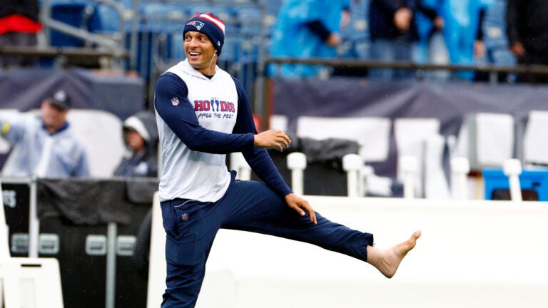 New England Patriots wide receiver Mack Hollins (13) warms up barefoot before the Patriots face the Las Vegas Raiders at Gillette Stadium on Sept. 7, 2025, in Foxborough.