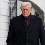 President Donald Trump talks to reporters as he departs from the South Lawn of the White House.