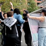 A group of demonstrators surrounded Israeli student Yoav Segev at a pro-Palestinian protest.