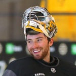 The Boston Bruins held a captain’s practice at Warrior Arena oin Thursday morning. Goalie Jeremy Swayman is all smiles at the end of practice.