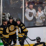 Boston Bruins center Morgan Geekie (39) celebrates a goal with right wing David Pastrnak (88) and center Fraser Minten (93) against Nashville Predators goaltender Juuse Saros (74) during the second period at TD Garden in Boston, MA on Tuesday, Jan. 27, 2026.