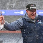 New England Patriots head coach Mike Vrabel celebrates with the trophy after the AFC Championship NFL football game between the Denver Broncos and the New England Patriots, Sunday, Jan. 25, 2026, in Denver.