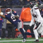 New England Patriots wide receiver Kayshon Boutte (9) catches a touchdown pass against Houston Texans cornerback Derek Stingley Jr. during the second half of an NFL divisional playoff football game, Sunday, Jan. 18, 2026, in Foxborough, Mass.