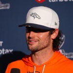 Denver Broncos quarterback Jarrett Stidham responds to questions after an NFL football practice at the team's headquarters Wednesday, Jan. 21, 2026, in Centennial, Colo.