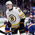 Boston Bruins center Alex Steeves reacts after scoring a goal past New York Islanders goaltender Ilya Sorokin in the first period of an NHL hockey game, Wednesday, Nov. 26, 2025, in Elmont, N.Y.