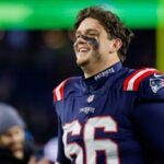 New England Patriots offensive tackle Will Campbell (66) reacts after defeating the Los Angeles Chargers in an NFL wild card playoff football game, Sunday, Jan. 11, 2026, in Foxborough, Mass.