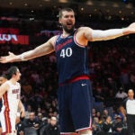 Los Angeles Clippers center Ivica Zubac (40) reacts to a call during the second half of an NBA basketball game against the Miami Heat, Monday, Dec. 1, 2025, in Miami.