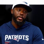 New England Patriots tight ends/passing game coordinator Thomas Brown talks to reporters after practice at Gillette Stadium on Sept. 4, 2025, in Foxborough.
