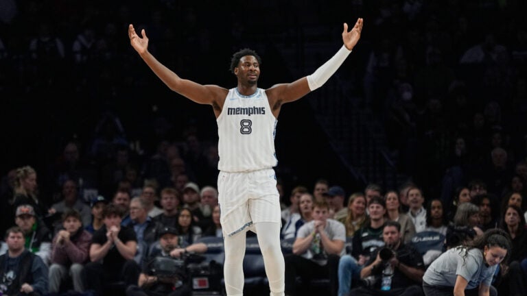 Memphis Grizzlies forward Jaren Jackson Jr. (8) looks toward a referee during the first half of an NBA basketball game against the Minnesota Timberwolves, Wednesday, Dec. 17, 2025, in Minneapolis.