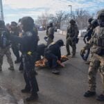 Protesters demonstrate against ICE.