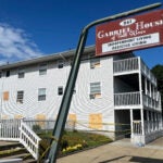 Boards cover the windows of the Gabriel House assisted living facility.