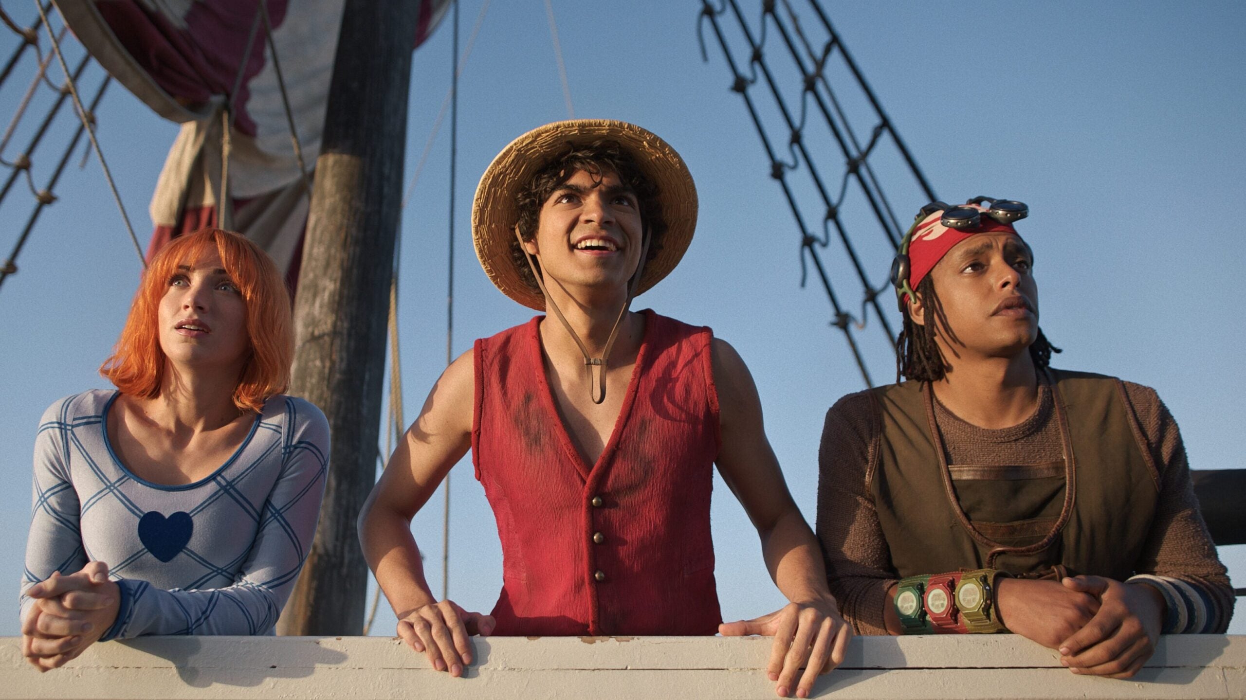 Emily Rudd as Nami, Iñaki Godoy as Monkey D. Luffy, Jacob Romero as Usopp in season 2 of One Piece.