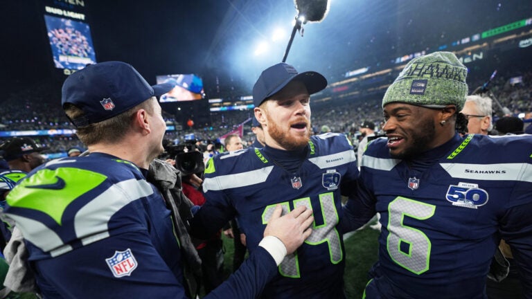5 things to know about Patriots Super Bowl LX foe Seahawks插图 Seattle Seahawks quarterback Sam Darnold, center, celebrates with quarterback Jalen Milroe (6) quarterback Drew Lock, left, after the NFC Championship NFL football game Sunday, Jan. 25, 2026, in Seattle.