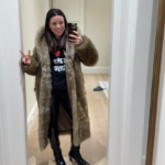 Ann Michael Maye work a "I [Heart] Drake Maye" hoodie on Sunday.