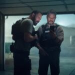 Ben Affleck as Det Sergeant JD Byrne and Matt Damon as Lieutenant Dane Dumars in The Rip.