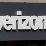 A Verizon sign is displayed on a store.