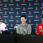 Boston Red Sox player Alex Bregman, Chief Baseball Officer Craig Breslow, and manager Alex Cora laugh during Bregman’s introductory press conference at JetBlue Park.