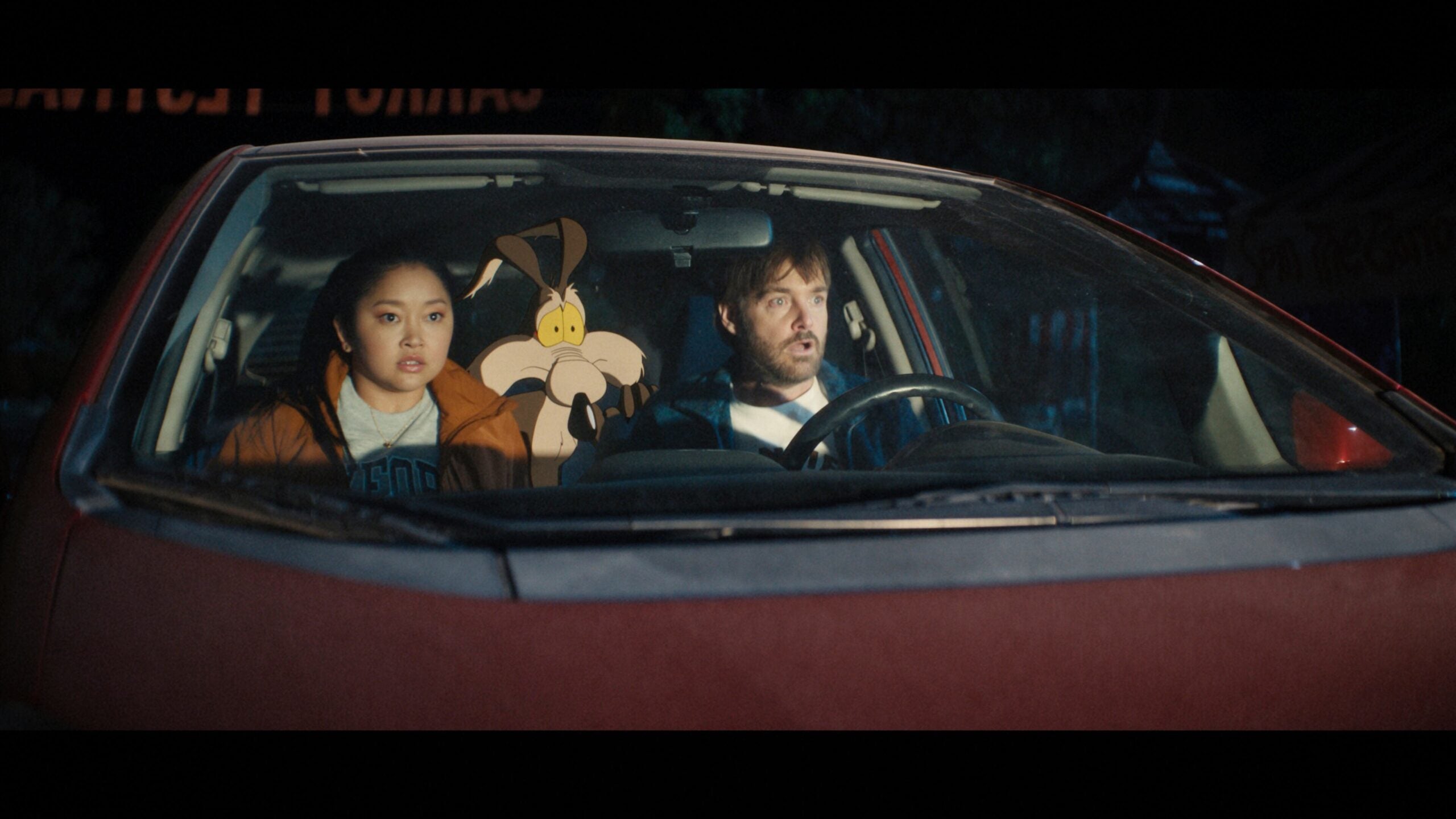 Lana Condor, left, and Will Forte in a scene from the film 