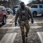 Federal agents conduct an immigration enforcement operation in Minneapolis.