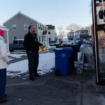 Two middle school teachers participating in a neighborhood watch.