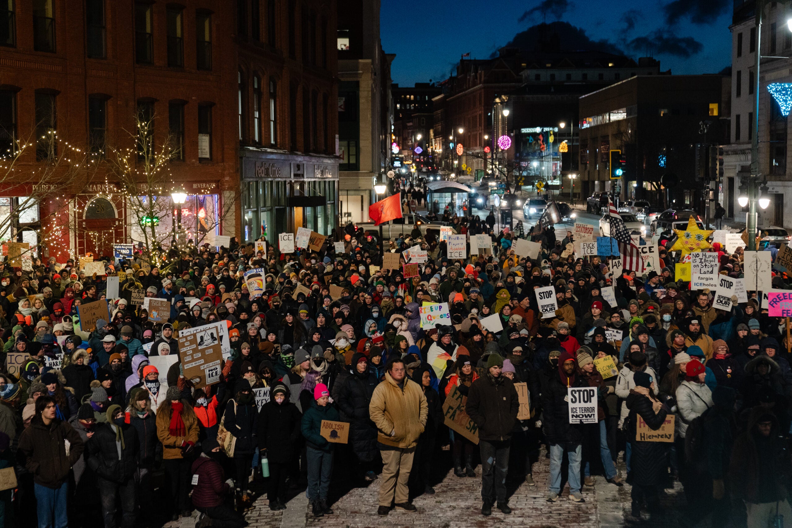 Hundreds gather to protest the actions of Immigration and Customs Enforcement agents at Monument Square in Portland, Maine.