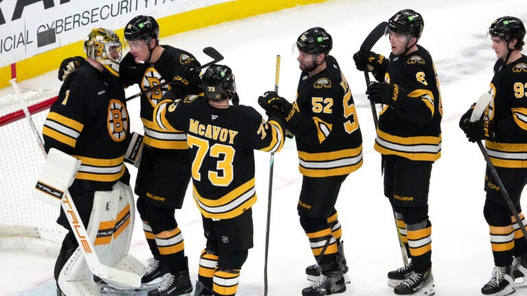 Boston Bruins goaltender Jeremy Swayman (1) and teammates celebrate his 3-0 shutout during the 3rd period. The Boston Bruins host the Detroit Red Wings Tuesday, January 13, 2026 at TD Garden in Boston, MA.