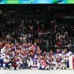 MILAN, ITALY - FEBRUARY 22: Gold medalists, Team United States, pose for a team photo during the medal ceremony following the Men's Gold Medal match between Canada and the United States on day 16 of the Milano Cortina 2026 Winter Olympic games at Milano Santagiulia Ice Hockey Arena on February 22, 2026 in Milan, Italy.