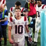 New England Patriots quarterback Drake Maye (10) and teammates walk off the field after losing to the Seattle Seahawks in the NFL Super Bowl 60 football game, Sunday, Feb. 8, 2026, in Santa Clara, Calif.