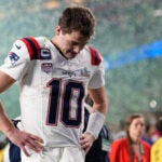 New England Patriots quarterback Drake Maye walks off the field after a loss to the Seattle Seahawks in the NFL Super Bowl 60 football game, Sunday, Feb. 8, 2026, in Santa Clara, Calif.
