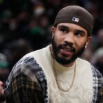Boston Celtics forward Jayson Tatum on the bench during an NBA basketball game, Monday, Jan. 5, 2026, in Boston.