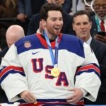 MILAN, ITALY - FEBRUARY 22: Gold medalist Jeremy Swayman #1 of Team United States celebrates following the Men's Gold Medal match between Canada and the United States on day 16 of the Milano Cortina 2026 Winter Olympic games at Milano Santagiulia Ice Hockey Arena on February 22, 2026 in Milan, Italy.