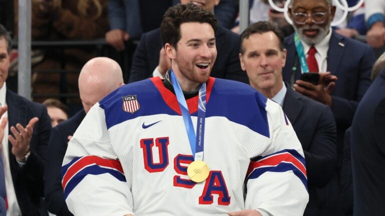 MILAN, ITALY - FEBRUARY 22: Gold medalist Jeremy Swayman #1 of Team United States celebrates following the Men's Gold Medal match between Canada and the United States on day 16 of the Milano Cortina 2026 Winter Olympic games at Milano Santagiulia Ice Hockey Arena on February 22, 2026 in Milan, Italy.