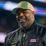 Former New England Patriots player Vince Wilfork reacts during the first half of an NFL football game against the New York Jets, Thursday, Nov. 13, 2025, in Foxborough, Mass.