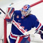 United States goalkeeper Aerin Frankel blocks a shot by Sweden during the second period of a women's ice hockey semifinal match at the 2026 Winter Olympics, in Milan, Italy, Monday, Feb. 16, 2026.