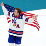 United States' Charlie McAvoy celebrates after the United States' win over Canada in the men's ice hockey gold medal game at the 2026 Winter Olympics in Milan, Italy, Sunday, Feb. 22, 2026.