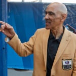 In this Aug. 3, 2019, file photo, former NFL player Tony Dungy is introduced before the induction ceremony at the Pro Football Hall of Fame in Canton, Ohio.