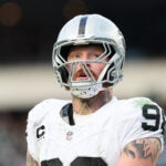 Las Vegas Raiders defensive end Maxx Crosby looks on between plays during the second half of an NFL football game against the Philadelphia Eagles, Sunday, Dec. 14, 2025, in Philadelphia..