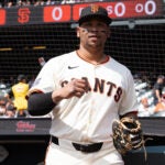 San Francisco Giants first baseman Rafael Devers walks onto the field before an MLB baseball game against the Colorado Rockies, Saturday, Sept. 27, 2025, in San Francisco.