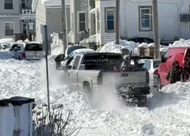 Pickup truck maneuvers snowy New Bedford street in wild video