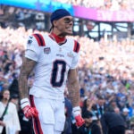 New England Patriots cornerback Christian Gonzalez (0) reacts before the NFL Super Bowl 60 football game against the Seattle Seahawks, Sunday, Feb. 8, 2026, in Santa Clara, Calif.