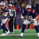 New England Patriots offensive tackle Will Campbell (66) blocks for quarterback Drake Maye (10) during the first half of an NFL divisional playoff football game against the Houston Texans, Sunday, Jan. 18, 2026, in Foxborough, Mass.