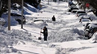 The story behind this viral photo of an unplowed Fall River street