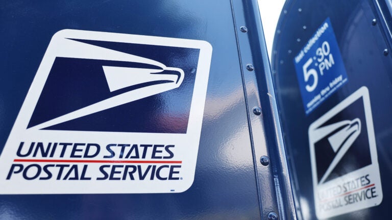 A former employee at a Westminster post office pleaded guilty Friday to obstruction and voyeurism charges.