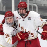 Boston MA 2/9/26 Boston University's Boston College's Dean Letourneau #29 celebrates his goal with teammate Ryan Conmy #36 during third period action during the Beanpot final at TD Garden on February 9, 2026.