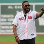 Boston Red Sox David Ortiz pumps his fist before throwing out the ceremonial first pitch before they play the New York Yankees during MLB action on Saturday September 13, 2025.