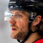 The Boston Bruins held practice at the Warrior Ice Arena on Wednesday. Pavel Zacha looks out during a drill.